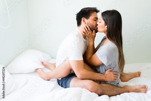 Adorable couple cuddling in the morning