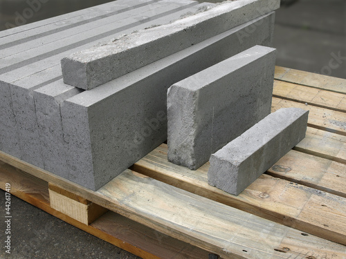 Concrete road blocks on a wooden pallet