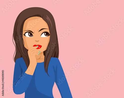 Young attractive pensive Hispanic Woman raises eyebrows and touches lips