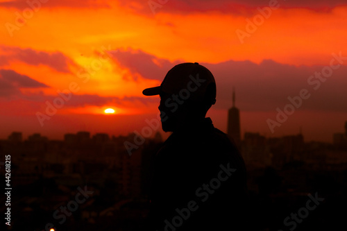 silhouette of a person in the sunset