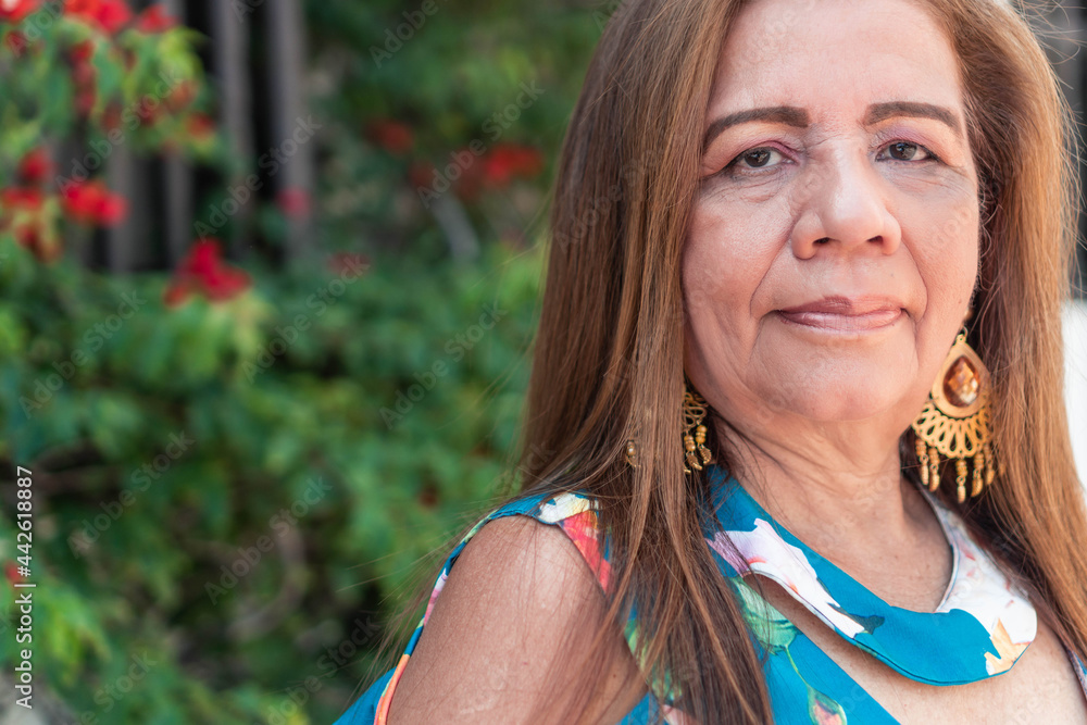 Portrait of a mature woman in the city