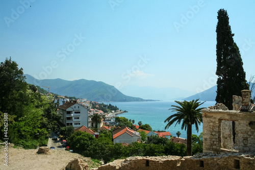 Panorama of the beach resort of Igalo with apartment buildings and holiday accomodation by the jadransko more sea. Igalo is a city of the Kotor Bay in Montenegro, next to Herceg Novi... photo