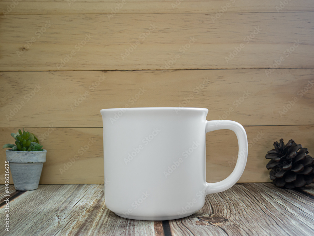 white mug on table wood for mockup or background white mug on table wood for mockup or background