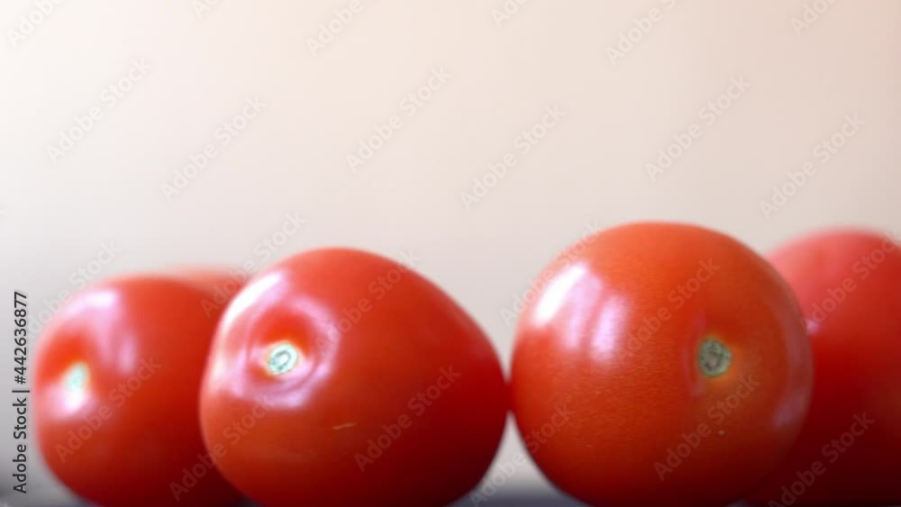 Red tomatoes spinning close up Red tomatoes spinning close up