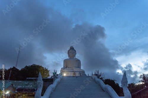 aerial view dark blue cloud over the Phuket big Buddha..Phuket Big Buddha another tourist attraction of Phuket..nature cloudscape sky and blue sea creative nature and travel concept..