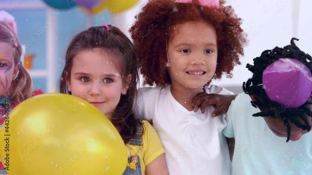 Animation of confetti over diverse happy children having fun at party Animation of confetti over diverse happy children having fun at party