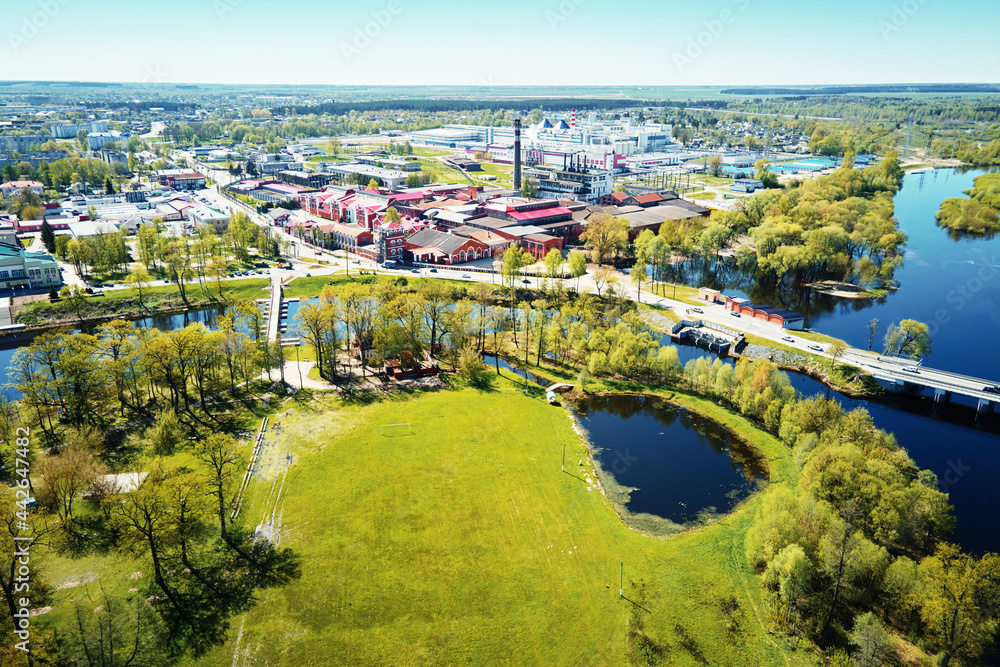 Obraz premium Moder paper factory aerial view. Small town landscape