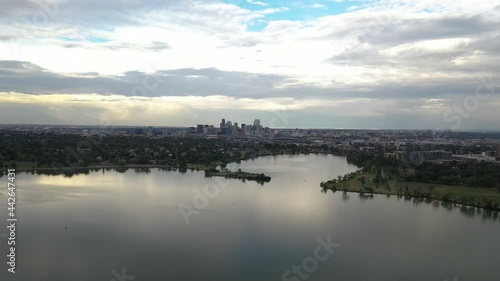 Aerial View, Sloans Lake Neighborhood and Downtown Denver, Colorado USA. Skyline and Sky Reflection on Water photo