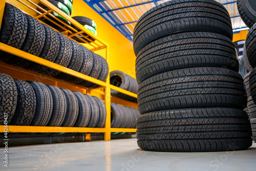 New tire warehouse room in stock There are plenty of them available to replace tires at a service center or auto repair shop. Tire warehouse for the car industry photo