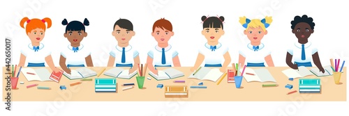 Children of different nationalities are sitting at their desks. The concept of teaching children from all over the world. Primary school, kindergarten, boarding school, home. Flat style. 