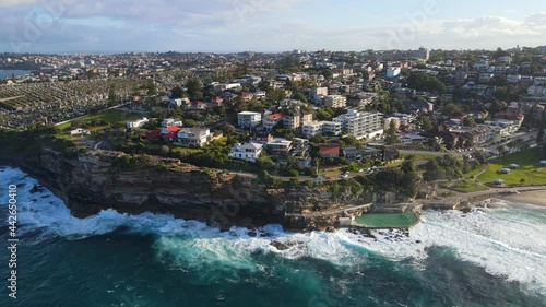 Waverley Cemetery And City Landscape Of Bronte At The Rocky Coastal Cliff In The Eastern Suburbs Of Sydney, Australia. aerial photo