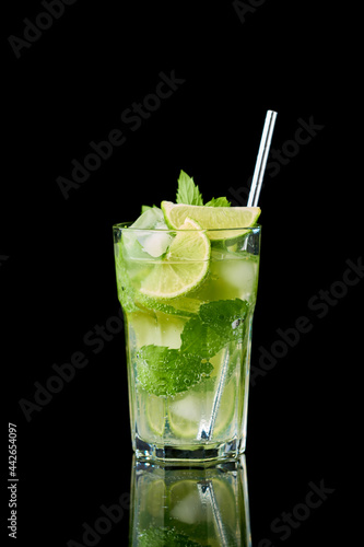 Glass of Fresh Mojito Cocktail - studio shot on black background