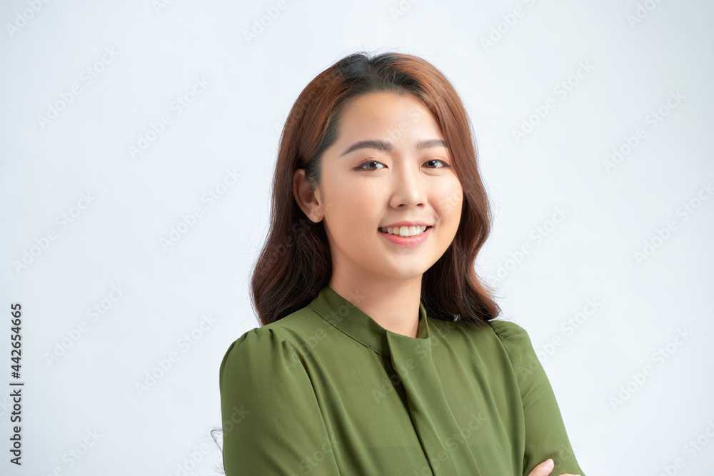 Carefree woman with crossed arms over white background Carefree woman with crossed arms over white background
