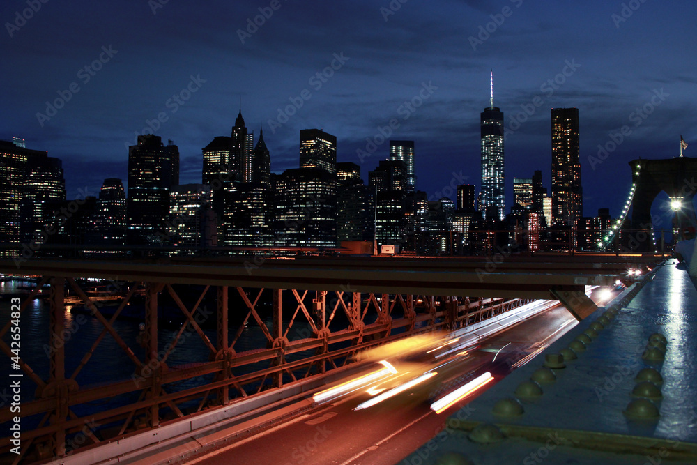 Brooklyn bridge skyline view of New York at night Brooklyn bridge skyline view of New York at night