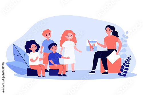 Young female teacher showing kids picture of giraffes. Woman teaching children, telling about animals flat vector illustration. Education, kindergarten, animals concept for banner, website design