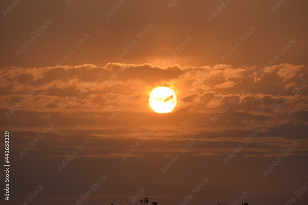 A beautiful view of rising sun in the morning A beautiful view of rising sun in the morning
