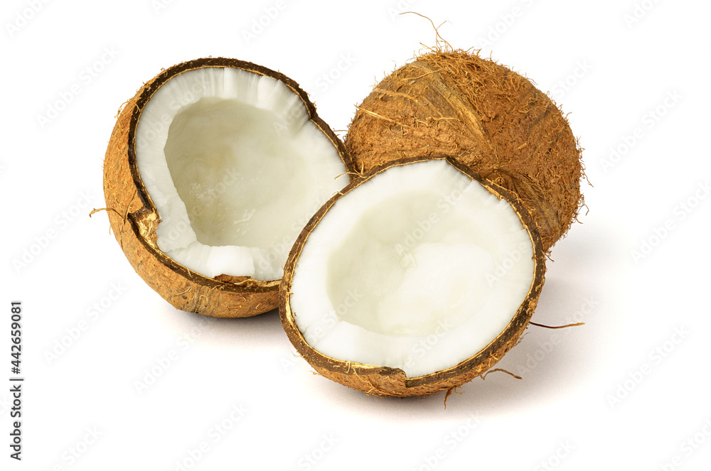 Coconut whole and two halves isolated on white Coconut whole and two halves isolated on white