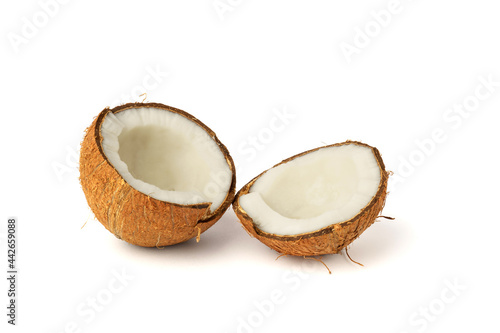two halves of coconut isolated on white