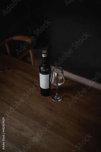 bottle of wine with a glass