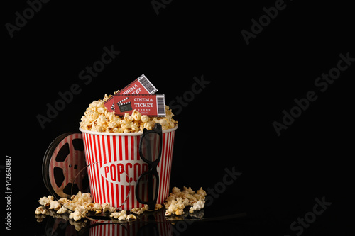 Tasty popcorn with film ree...