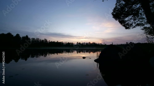 Timelapse of peaceful wilderness, Summer night outside Tallinn, Estonia photo