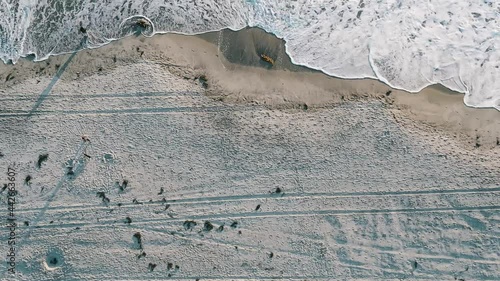 A flight out over the waves at the beach. San Elijo CA
