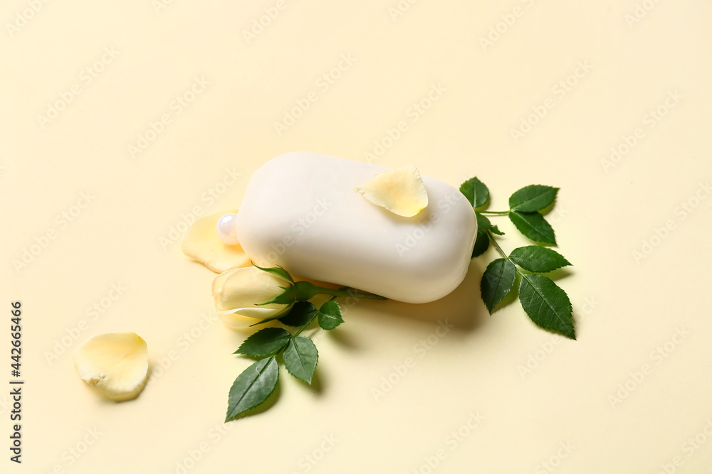 Soap bar and flower on color background Soap bar and flower on color background