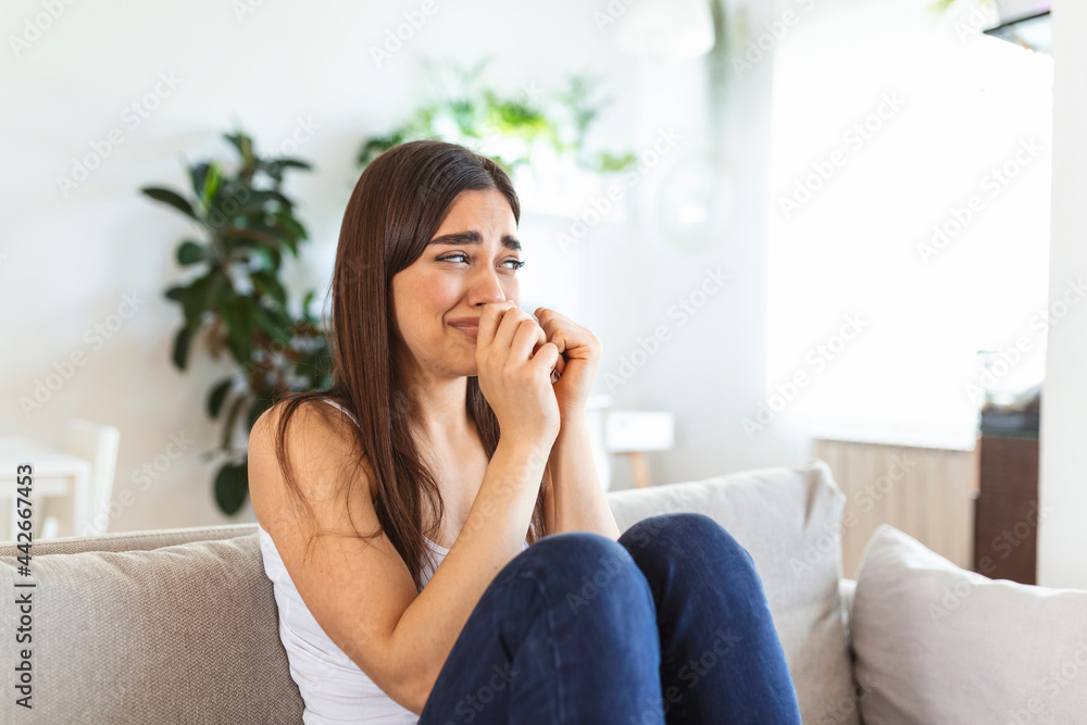Close up young woman feeling upset, sad, unhappy or disappoint crying lonely at home. Emotional shock and life problems Close up young woman feeling upset, sad, unhappy or disappoint crying lonely at home. Emotional shock and life problems