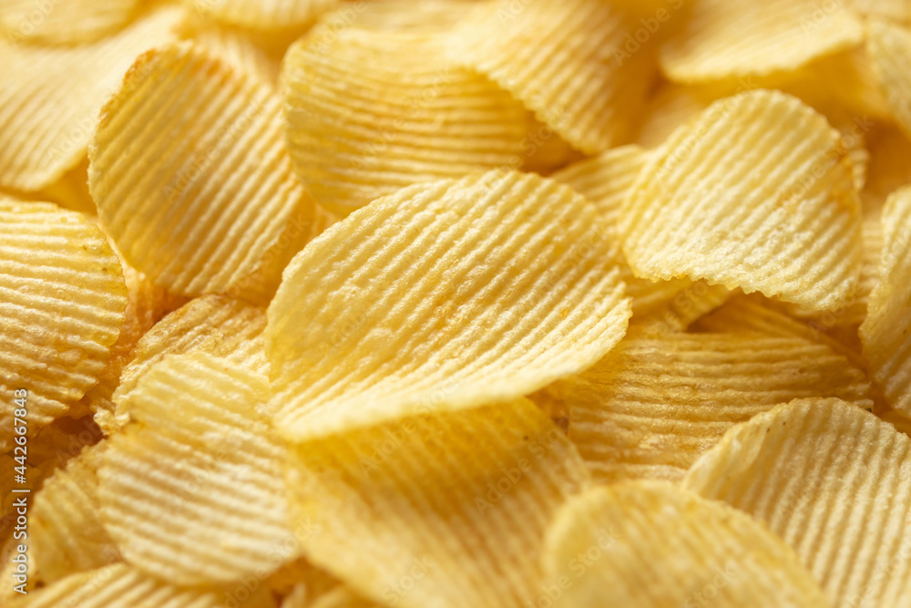 crispy golden potato chips snack texture background crispy golden potato chips snack texture background