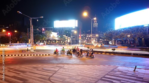 Chiang Mai, Thailand - April 8, 2020:  Time Lapse of traffic on Rin Kham intersection at night between Nimman Road during Quarantine Coronavirus outbreak or Covid-19 photo