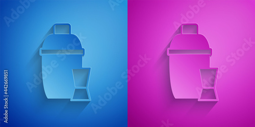 Paper cut Cocktail shaker with cocktail glass icon isolated on blue and purple background. Paper art style. Vector