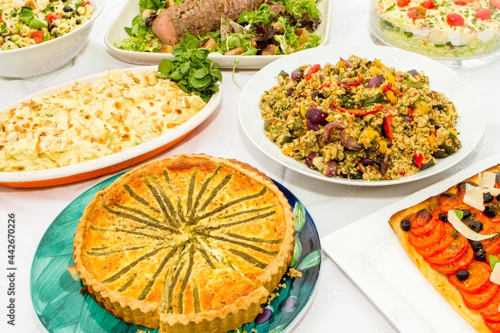 Plates of food on a white background with natural light Plates of food on a white background with natural light