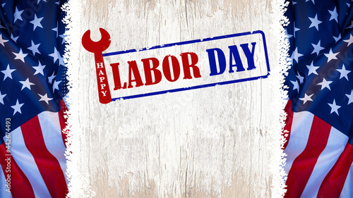 Happy Labor Day background greting card template - American waving flag and lettering with working symbols, isolated on rustic white wooden wall board wood texture. photo