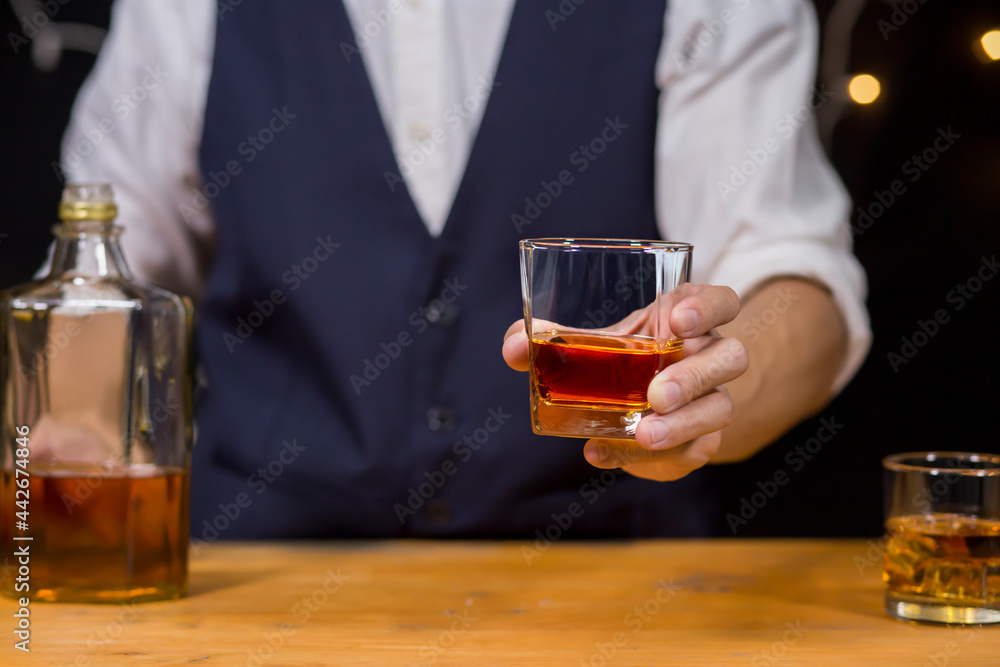 Bartender Serve Whiskey, on wood bar, Bartender Serve Whiskey, on wood bar,