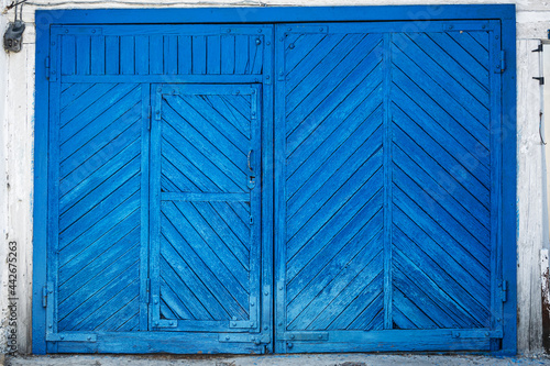 Wooden garage gates made of planks. Wood texture