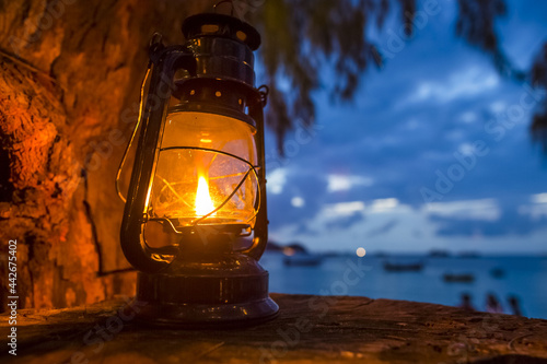 Lantern on the Beach after Sunset