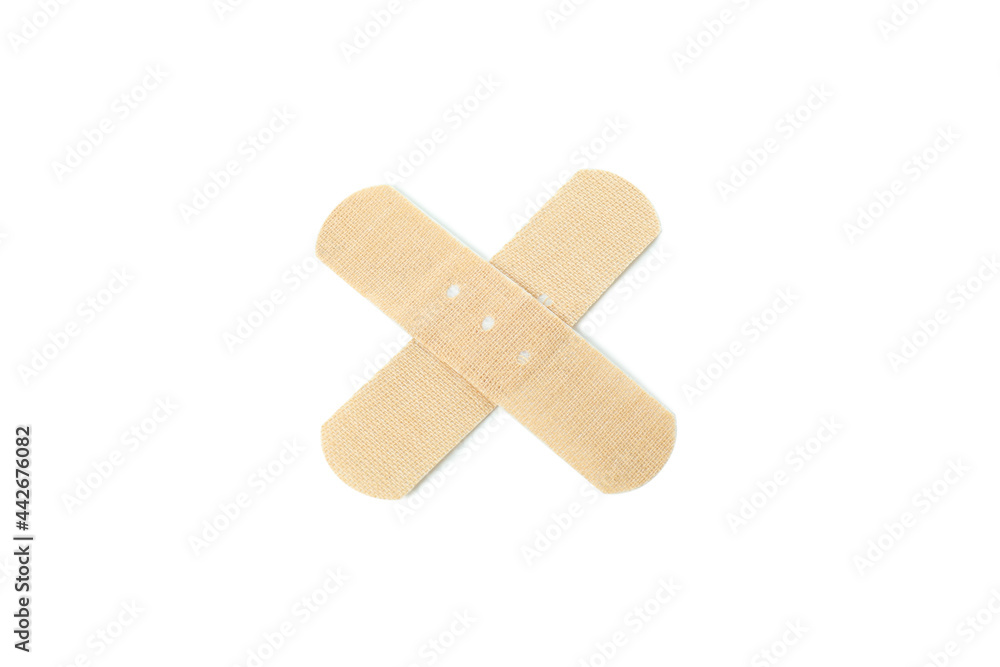 Cross made of medical patch, isolated on white background Cross made of medical patch, isolated on white background