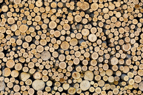 Pile of firewood seamless texture or background