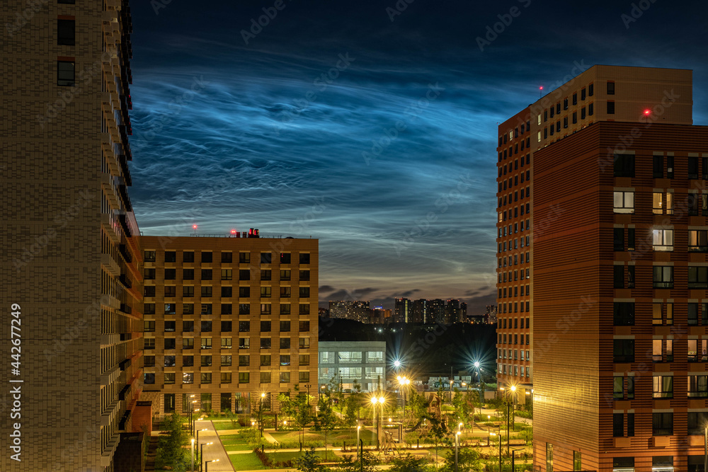 Fototapeta premium Silver clouds. Noctilucent clouds are bright cloudlike atmospheric phenomena visible in a deep twilight. They are the highest clouds in the Earth's atmosphere.
