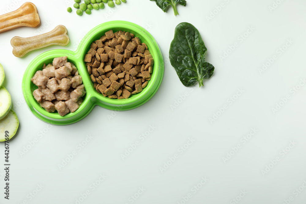 Concept of organic pet food on white background Concept of organic pet food on white background