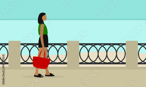 Female character in summer clothes and with a bag in hand walks along the embankment
