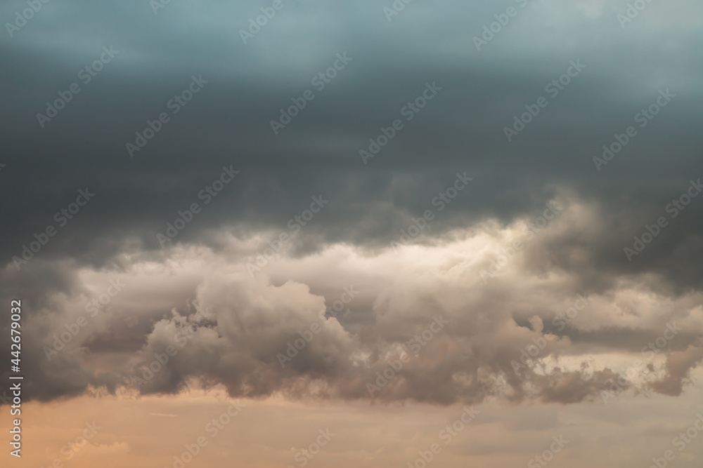 Beautiful sunset sky above clouds with dramatic light, Beautiful blazing sunset landscape, Copy space, Selective focus.