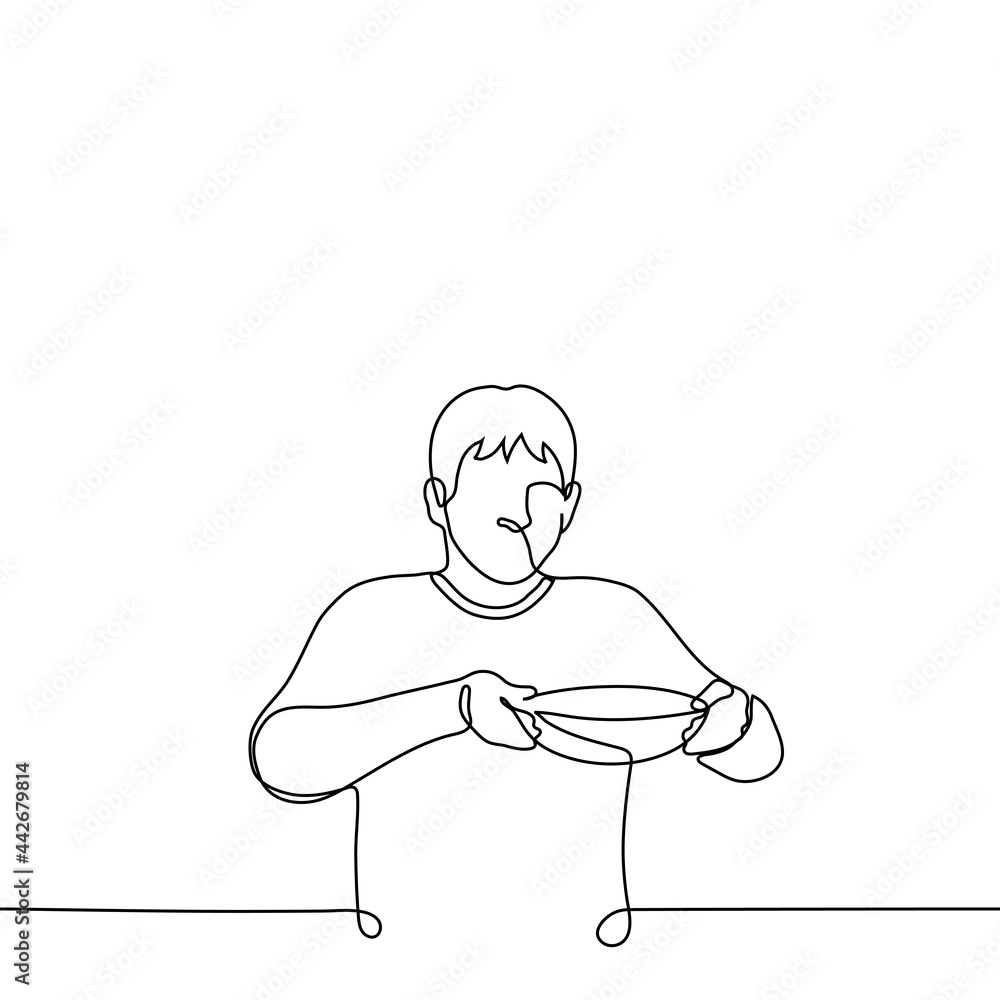 man carefully carries a deep round plate in front of him - one line drawing. a man stands or walks and holds a full plate by the edges
