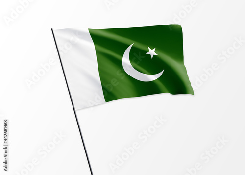 Pakistan flag flying high in the isolated background Pakistan independence day