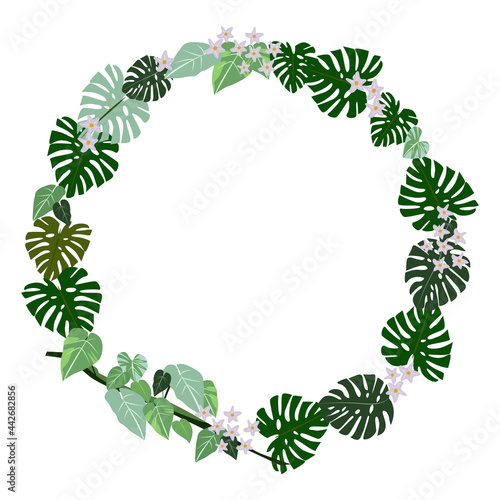 Exotic round frame made of tropical plants, green leaves and lilac flowers, vector illustration