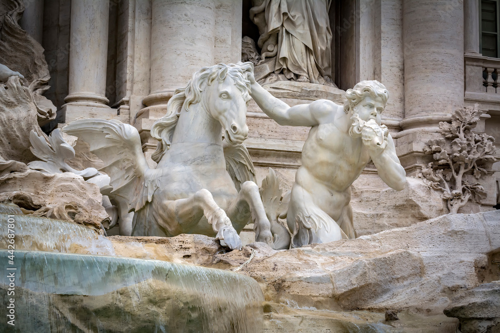 The statues of Triton and Hippocamp,Trevi Fountain, Rome, Italy The statues of Triton and Hippocamp,Trevi Fountain, Rome, Italy