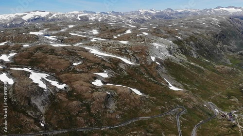 Summer mountains landscape with snow and lakes. National tourist scenic route 55 Sognefjellet in Norway. Aerial view photo
