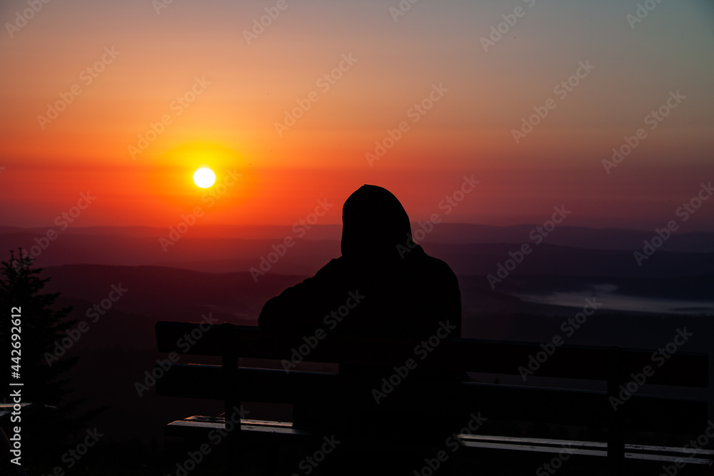 A Men looking at sunset 