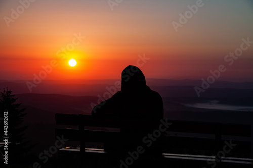 A Men looking at sunset 
