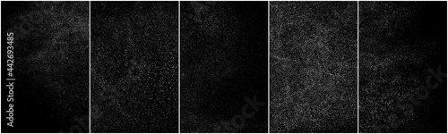 Set of distressed white grainy texture. Dust overlay textured. Grain noise particles. Snow effects pack. Rusted black background. Vector illustration, EPS 10.   
